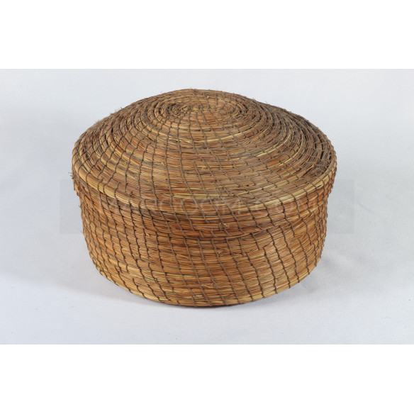 Brown decorative basket in vegetable fiber