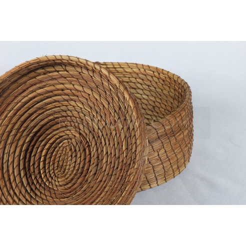 Brown decorative basket in vegetable fiber