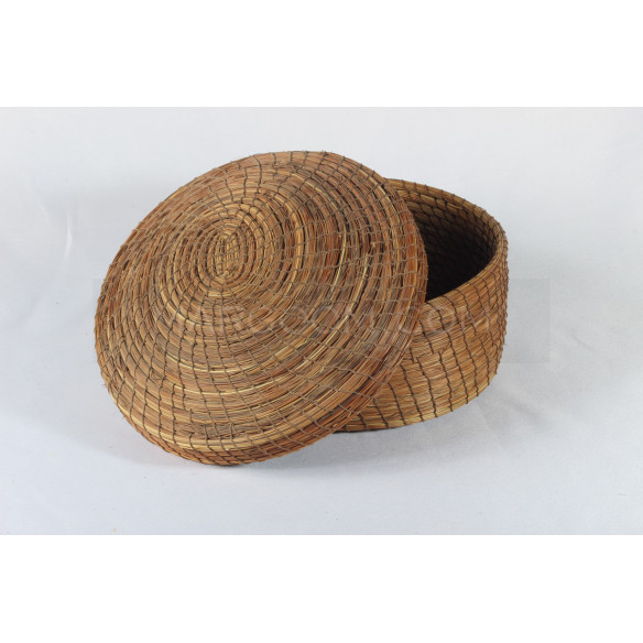 Brown decorative basket in vegetable fiber