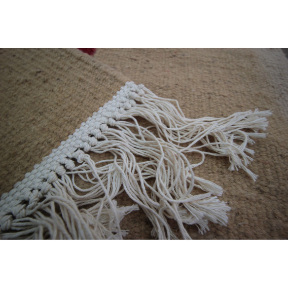 Black and white speckled beige kilim rug