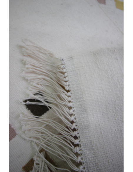 Kilim style carpet with fringes white background geometric pattern