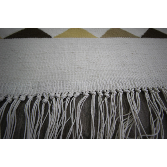 White kilim rug with colorful triangle pattern